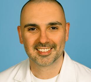 Dr. Jonian Sinaj